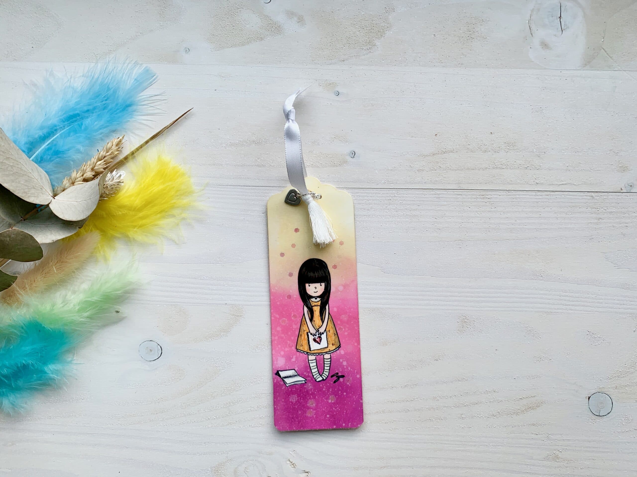 Lesezeichen mit Charm und Quaste 13