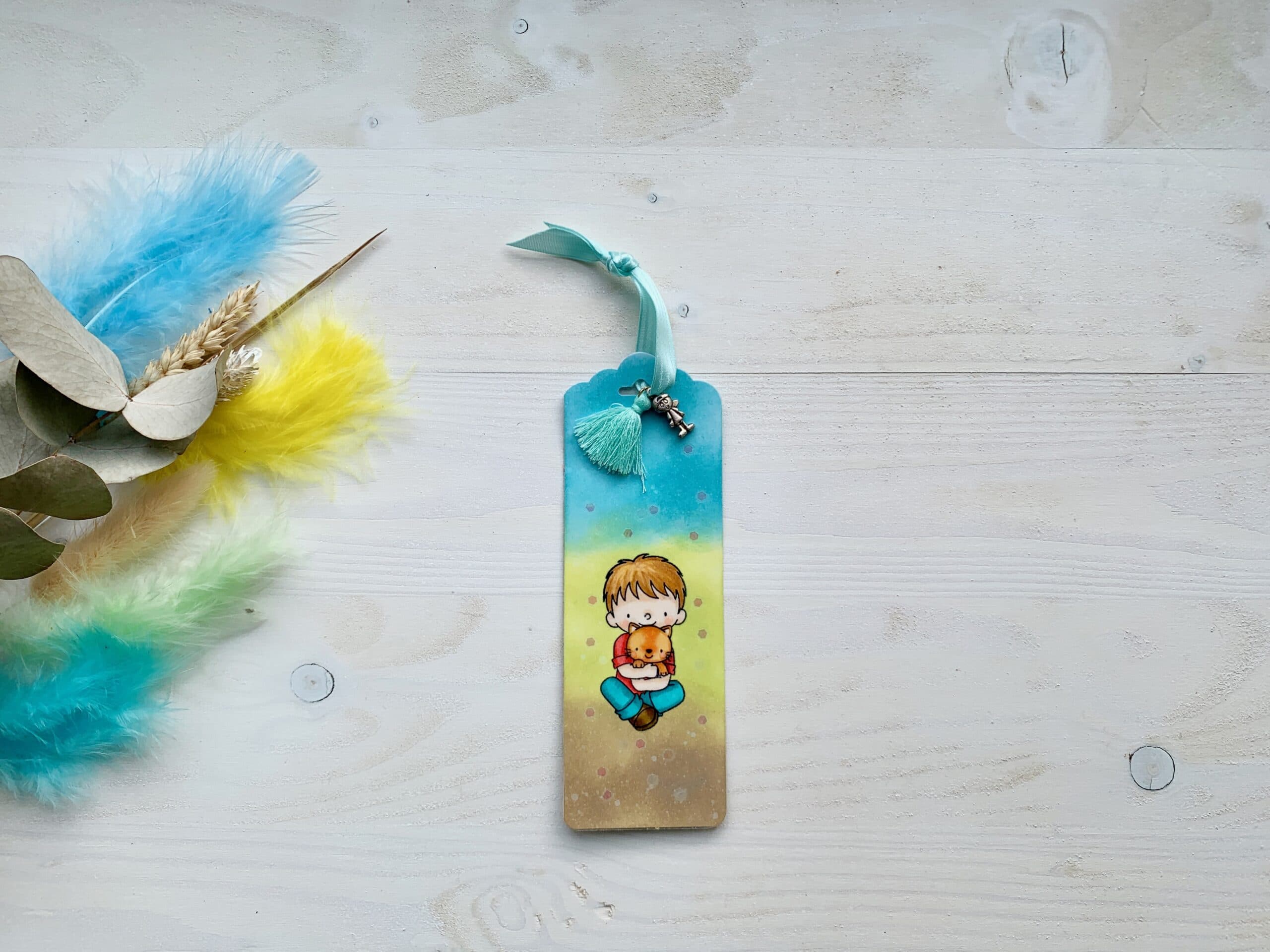 Lesezeichen mit Charm und Quaste 11